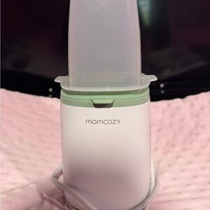 White and Green Baby Bottle Warmer